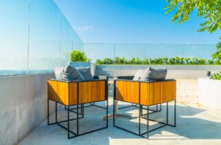 Outdoor patio decoration with char and table on blue sky